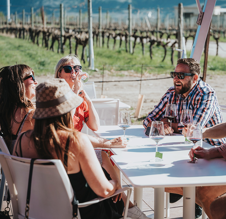 Group tasting wine at Red Barn Winery in Oliver